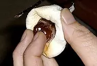 Country Homes Camper - Date Marshmallow - Hand with a marshmallow and date